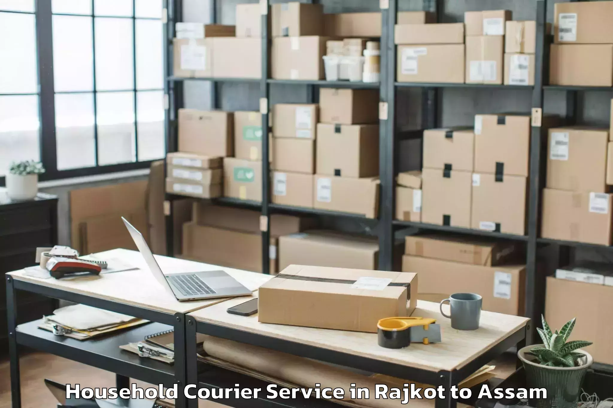 Book Rajkot to Narayanpur Lakhimpur Household Courier